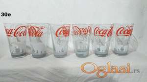 Coca Cola čaše bele mede crvena slova